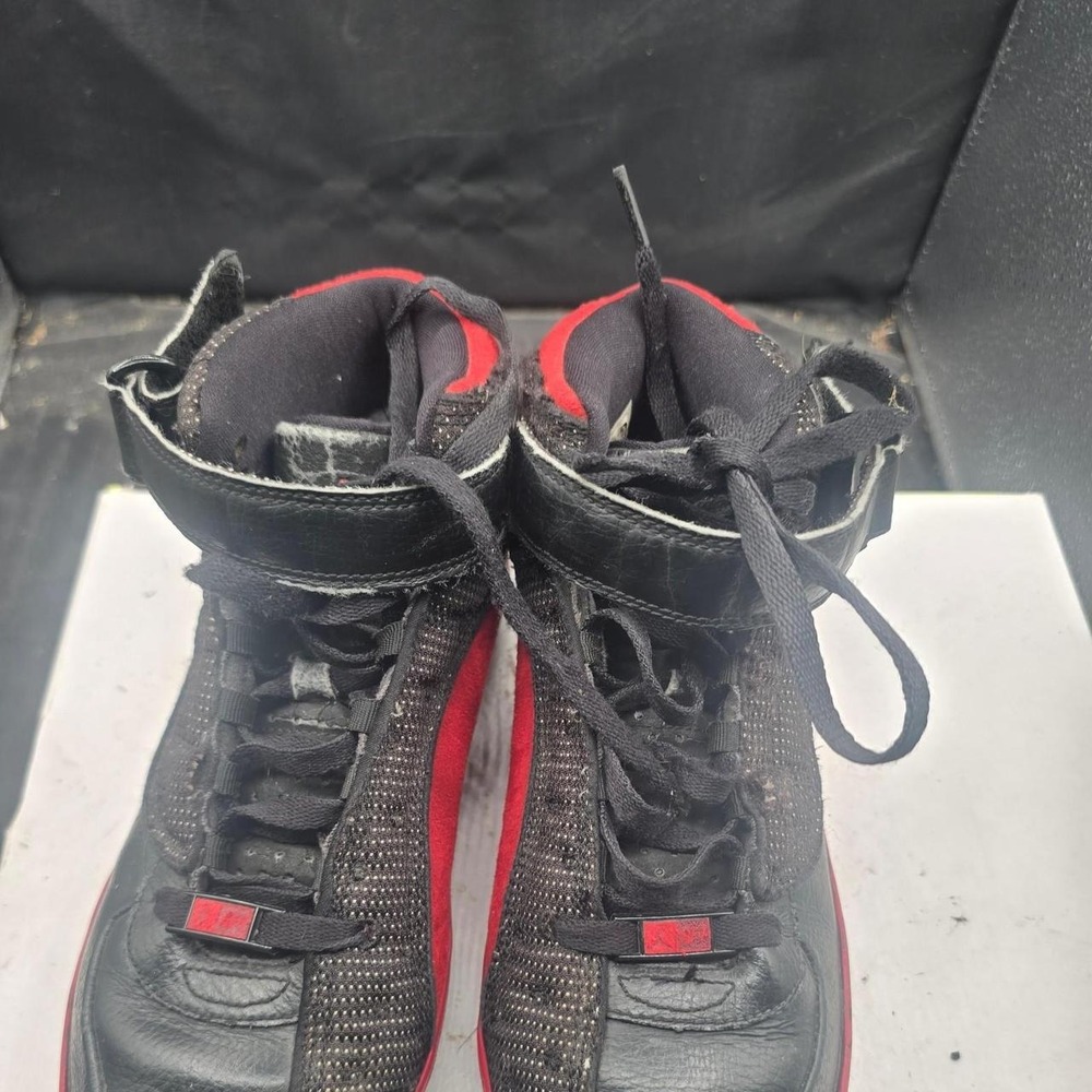 Nike Air Jordan 12 black and red trainers